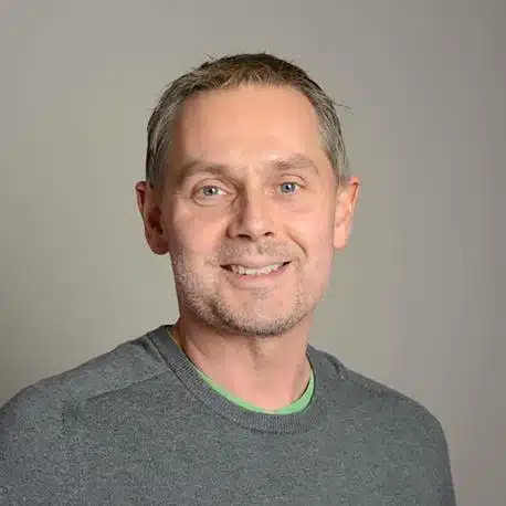 Professor Alex Nicholls headshot.
