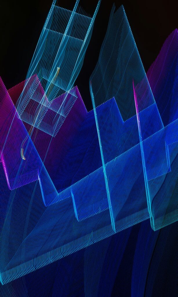 Blue and purple light patterns on a black background